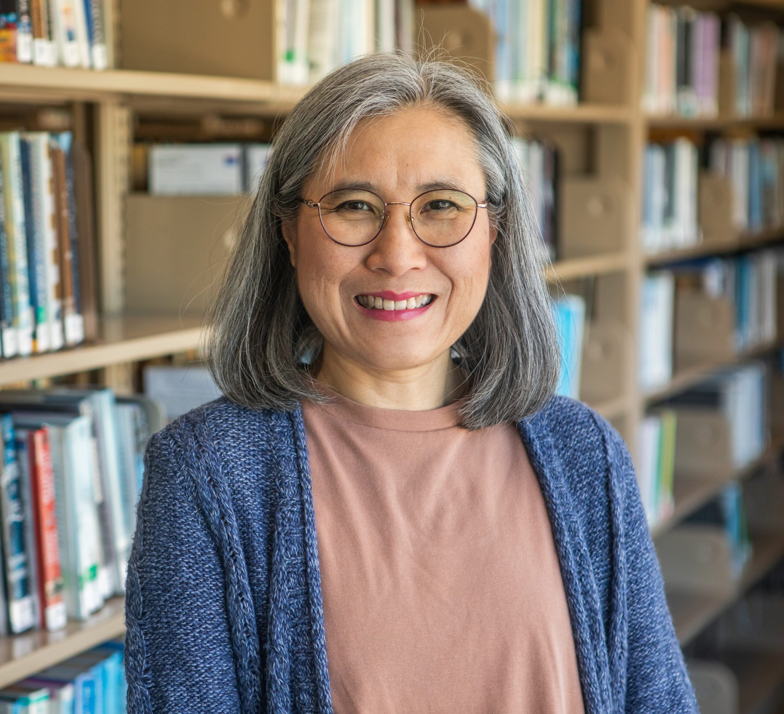 Another photo of author in a library